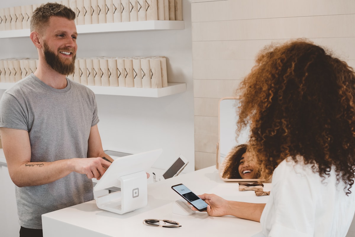 Small business owner confidently managing their online store on a laptop