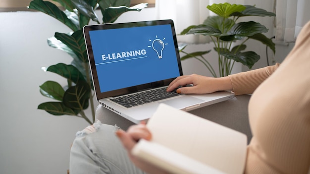 A laptop displaying an online training course with interactive modules